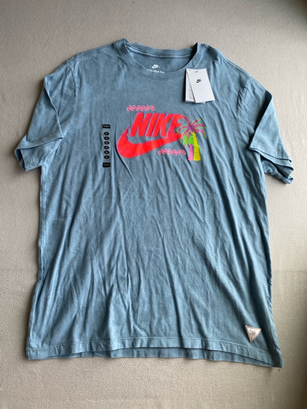 Nike Light Blue Short Sleeve Tee with Neon Pink Logo and Yellow-Green Palm